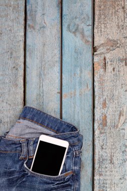 Dokunmatik akıllı telefon-telefon kulaklık mavi w üzerinde kot pantolon cebinde ile