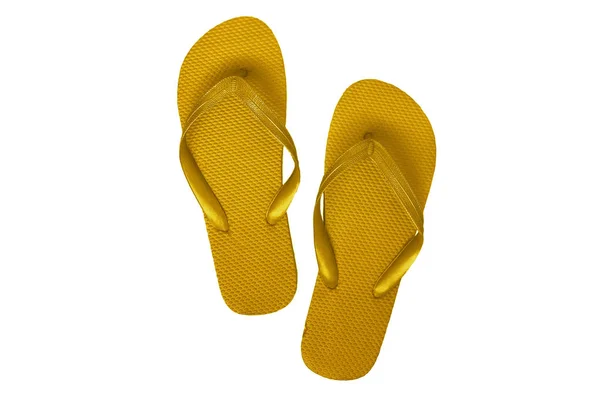 Yellow rubber flip flops, isolated on white background Royalty Free Stock Photos