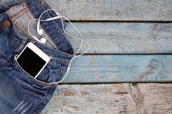 Dokunmatik akıllı telefon-telefon kulaklık mavi w üzerinde kot pantolon cebinde ile