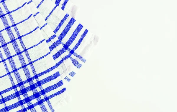 Mavi kumaş, bir beyaz bir kareli desenli mutfak havlusu