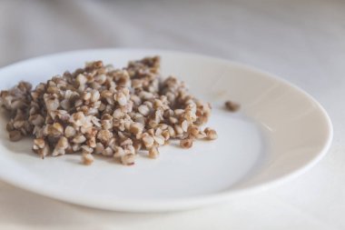  buğday lapası gölge ile beyaz arka plan üzerinde plaka