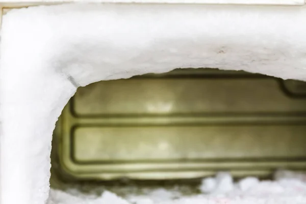 The freezer of a refrigerator is full of huge amounts of ice due — Stock Photo, Image