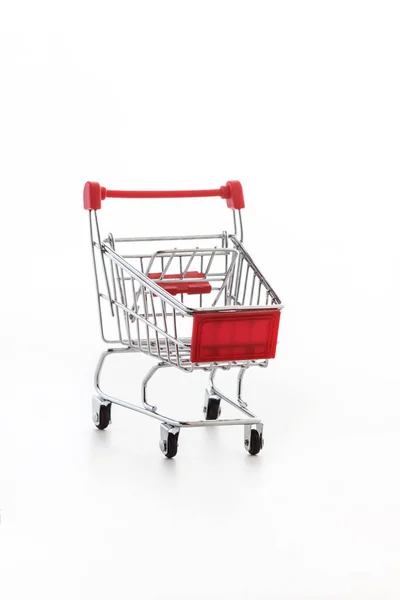 Primer plano de supermercado carrito de compras empuje para ir de compras con blac —  Fotos de Stock