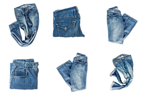 Sammlung von gefalteten Jeans isoliert auf weißem Hintergrund — Stockfoto
