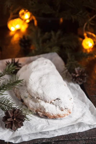 Dresden Stollen is a Traditional German Cake with raisins on a l