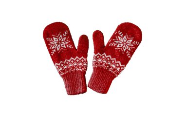 Bir çift kırmızı eldiven ördü ve noel deseni izole edildi.