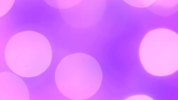 Lumières rose-violet festives clignotantes dans le flou bokeh. Fixé. Concept, Noël et célébration du Nouvel An .