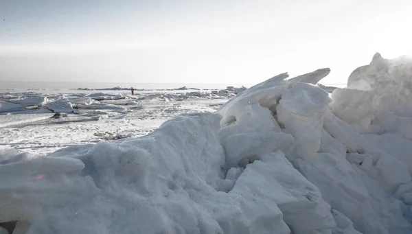 Icy Snow Covered Hummocks Bright Sun Light Pink Cloudy Sky — Zdjęcie stockowe