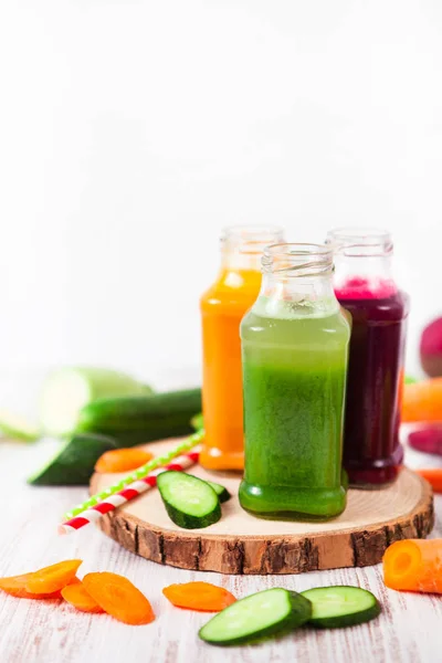 Freshly squeezed vegetable juice in bottles, useful vitamin cock — Stock Photo, Image