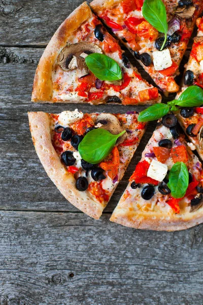 Homemade Pizza with tomato sauce, artichoke hearts, olives, Parm — Stock Photo, Image