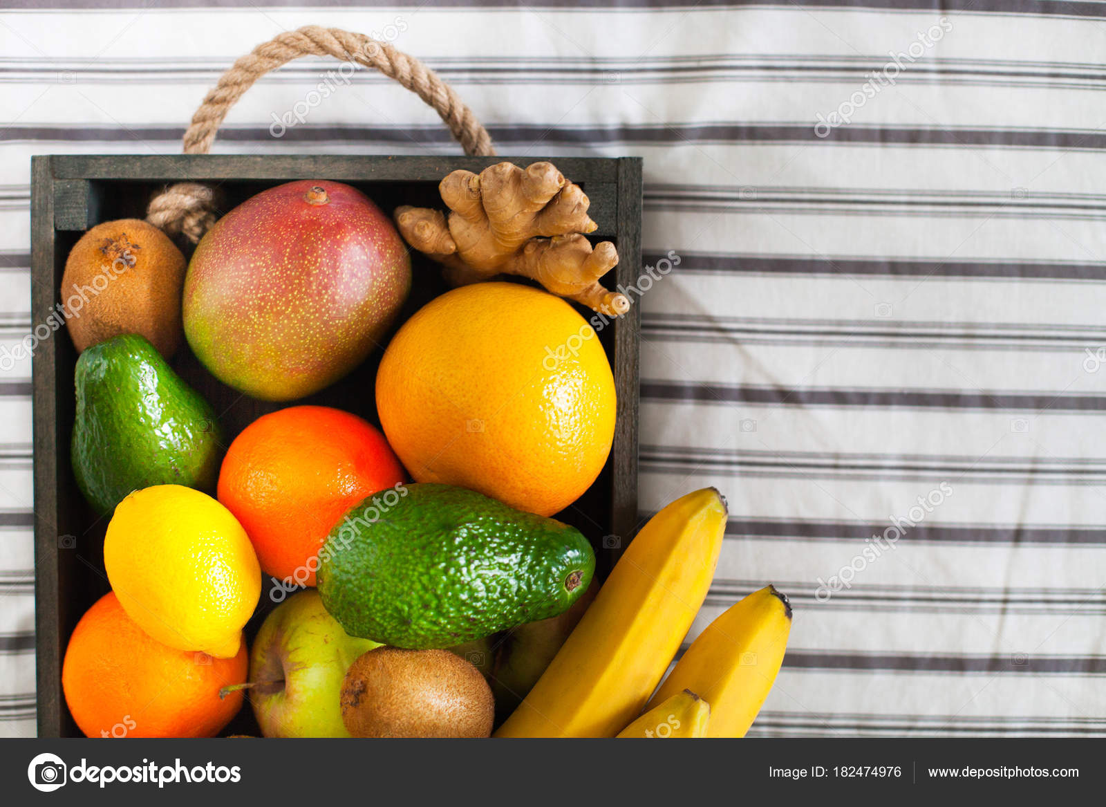 Fresh Delicious Fruits In A Wooden Box On The Bed Summer Health Fresh Delicious Fruits In A Wooden Box On The Bed Summer Health Stock Photo