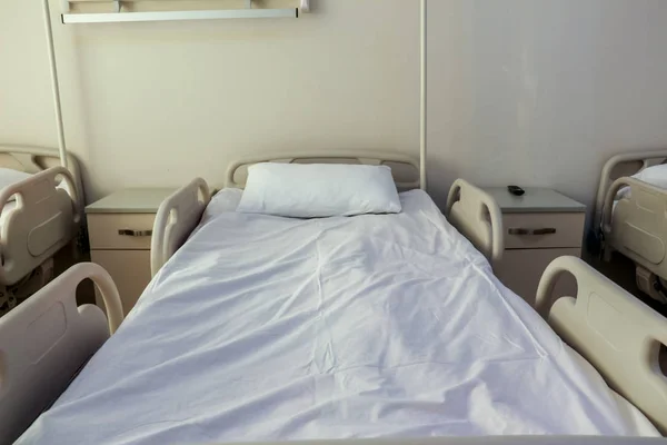 Empty Hospital or clinical room with comfortable beds.