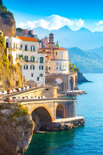 Morning view of Amalfi cityscape on coast line of mediterranean sea, Italy
