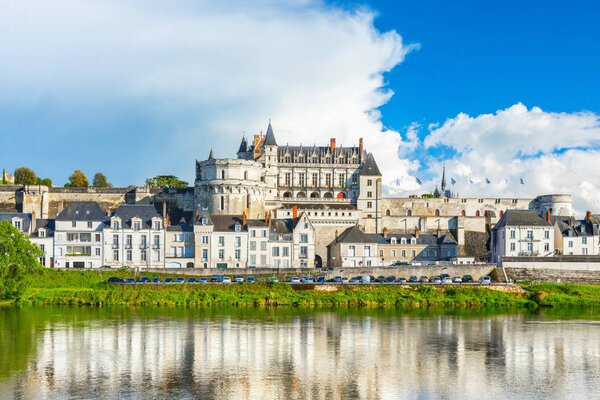 Beautiful view on the skyline of the historic city of Amboise with renaissance chateau across the river Loire. France