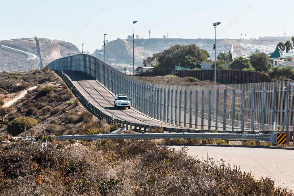 San Diego-Tijuana International Border Wall and Border Patrol Vehicle