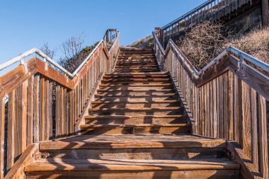 View looking up of stairway for beach access to South Carlsbad State Beach in San Diego, California. clipart