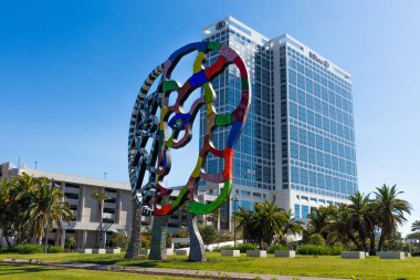 SAN DIEGO, CALIFORNIA/USA - MARCH 21, 2020:  Located near the convention center and Hilton Hotel, Niki de Saint Phalle's iconic Coming Together sculpture resembles an engaging, dual-faced figure. clipart