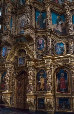 The ancient baroque carved gold plated iconostasis of the Military Cathedral of Christ's Resurrection of Don Cossack Host in the stanitsa Starocherkasskaya  clipart