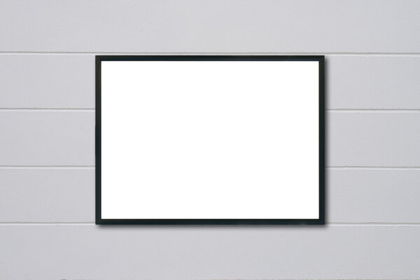 Mock up blank frame hanging on wall in room