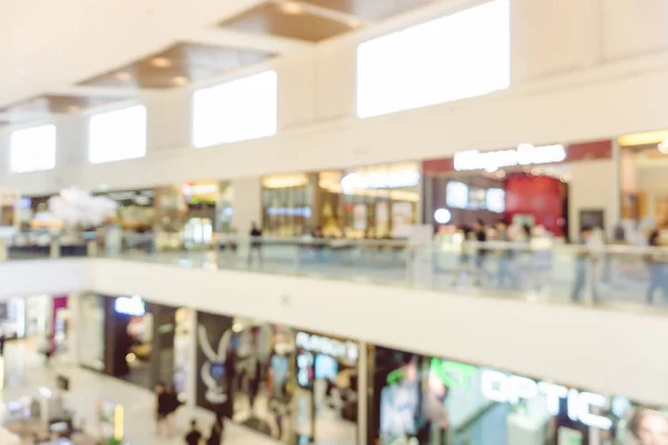 Fundo desfocado - Loja de shopping center desfoque fundo com bokeh. imagem filtrada vintage . — Fotografia de Stock