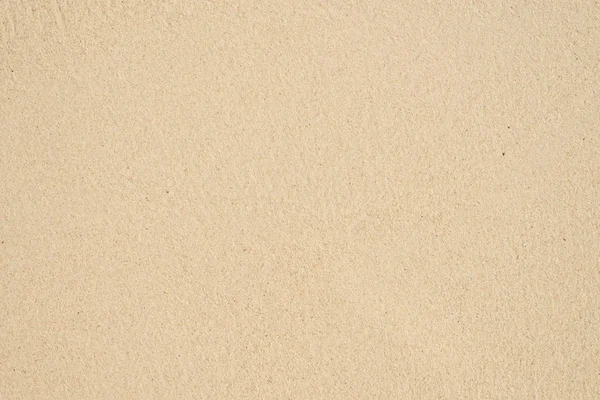 Closeup of sand pattern of a beach in the summer. Beach background. Top view — Stock Photo, Image