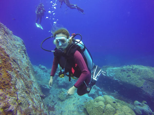 Underwater scuba diving selfie shot with selfie stick. Deep blue sea. Wide angle shot. — Stock Photo, Image