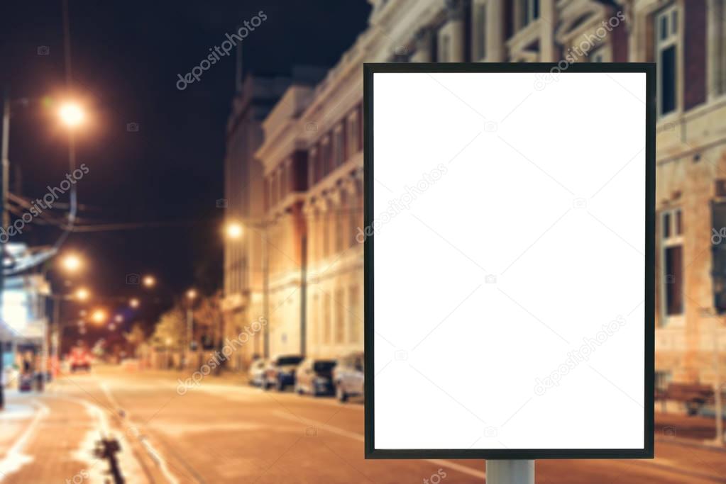 Blank mock up of vertical street poster billboard sign with copy space for your text message or content on city background