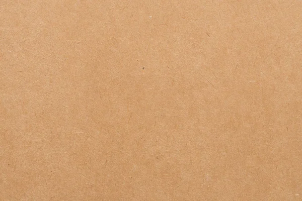 Papírová textura - hnědé kraft list pozadí. — Stock fotografie