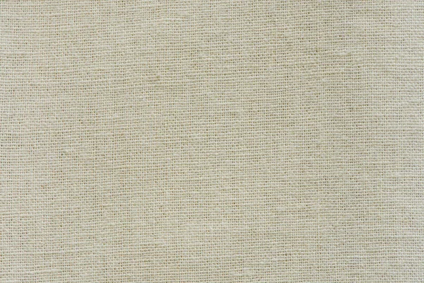 Patrón de textura tejida de tela de saco de Hesse fondo en tono de color marrón crema beige amarillo: Eco amistoso tela de lino orgánica cruda telón de fondo textil: hilo de cuerda bolsa detallada tela de arpillera texturizada —  Fotos de Stock