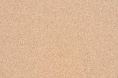 Kum dokusu. Kahverengi kum. İnce kumdan bir arka plan. Kum arkaplanı.