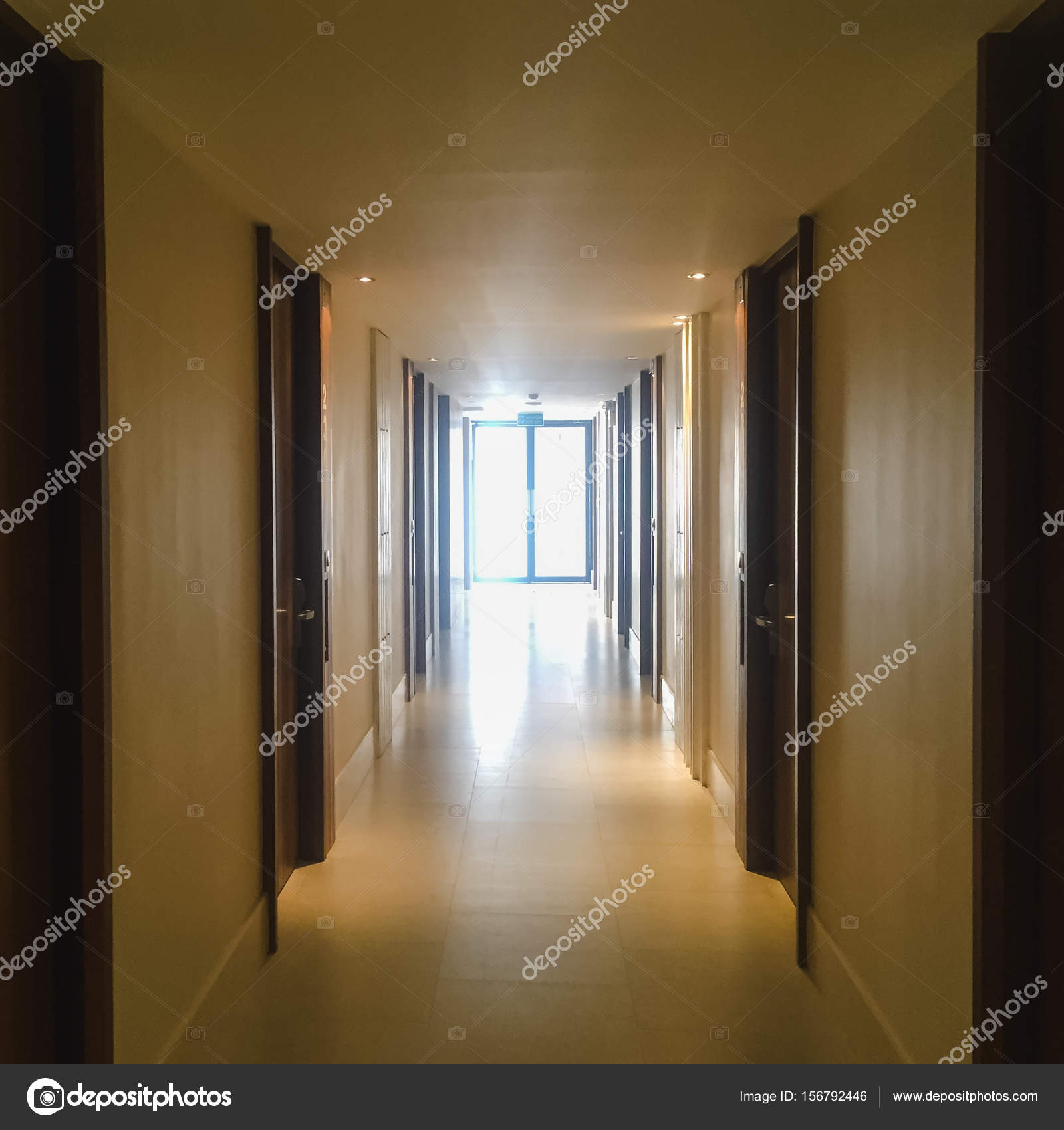 Light Brown House With Dark Brown Trim Corridor With Lots