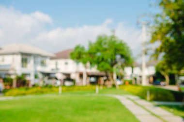 Arka plan bulanık - Bokeh binanın bulanıklık ve güneş ışığı ile park, arka plan bakış açısı ile için kullanın. Vintage filtre uygulanmış görüntü.