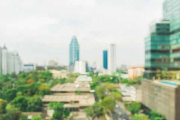 Blurred industrial city backgrounds - Blur of Bangkok city town with sunset and twilight sky and bokeh light view form roof top of building. Blur backgrounds concept.