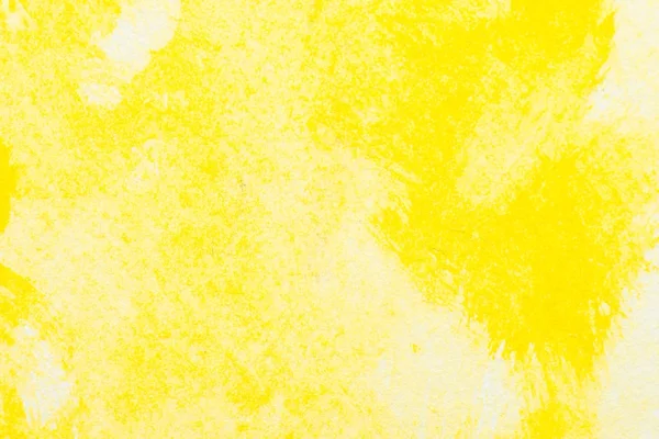 Aquarelle abstraite jaune texturée sur fond de papier blanc — Photo