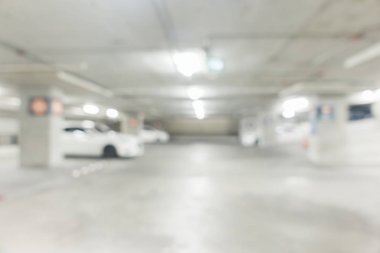 Soyut araba park yeri için arka plan bulanıklık, park arabalar ile bulanıklık. Bulanık yeraltı otoparkına retro Instagram stil filtreli.