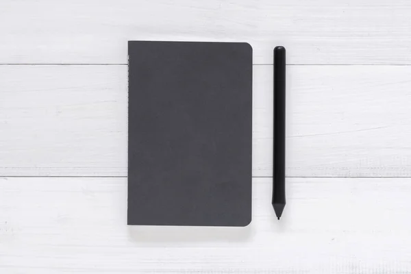 Minimal work space - Creative flat lay photo of workspace desk. White office desk wooden table background with mock up notebooks and pen. Top view with copy space, flat lay photography