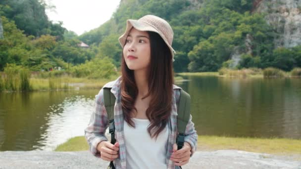 Cheerful Young Traveler Asian Lady Backpack Walking Mountain Lake Korean — Stock Video