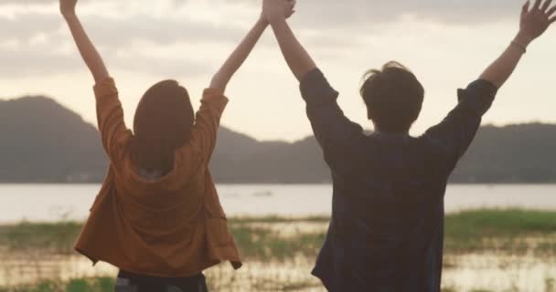 Young Asia Campers Couple Standing Raised Arms Campsite Beach Happy — Stock Video