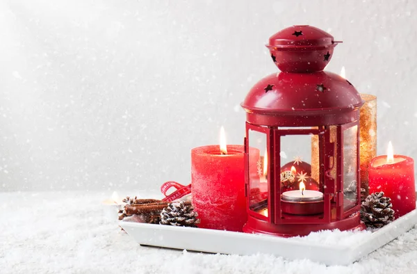 Christmas lantern with candle, snow, christmas decorations — Stock Photo, Image
