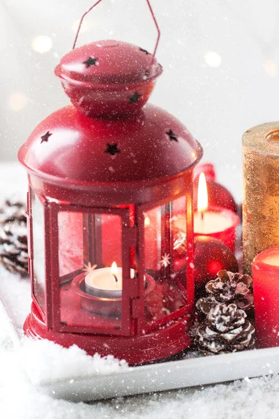 Christmas lantern with candles, snow, christmas decorations and fir cones. Christmas, holiday or winter concept. — Stock Photo, Image