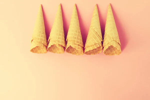 Empty Colorful Pastel Toning Ice Cream Cones on Pink Background. — Stock Photo, Image