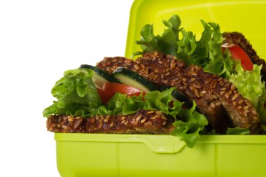 Lezzetli sağlıklı vejetaryen Vegan beslenme çantası beyaz masada sandviçte