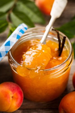 Cam Kavanoz meyveleri ve vanilya lezzetli meyve turuncu kayısı