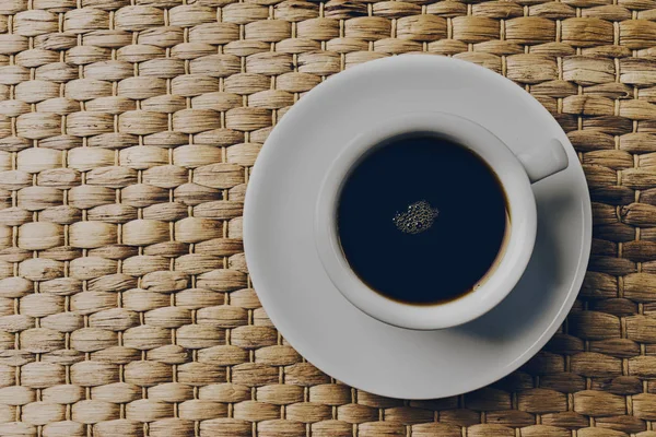 Tasty classic coffee espresso in small white ceramic cup — Stock Photo, Image