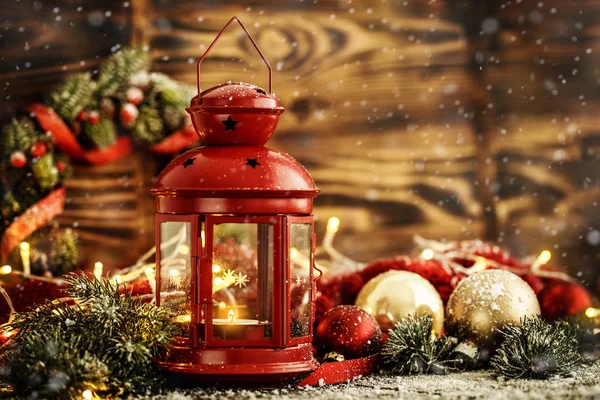Christmas balls and lantern with candle — Stock Photo, Image