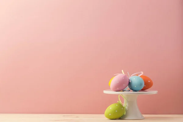 Bright eggs composed on stand — Stock Photo, Image