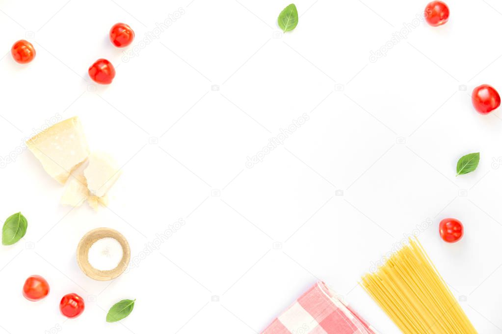 Raw pasta with cheese and tomatoes