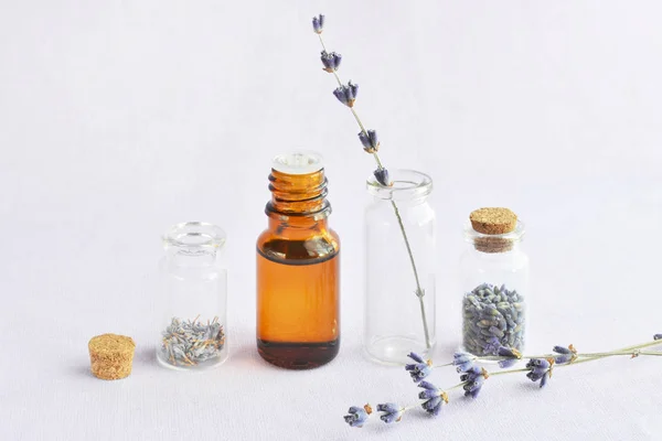 Lavender oil and flowers — Stock Photo, Image