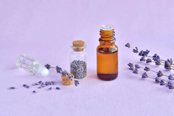 lavender oil, perfume and dry flowers