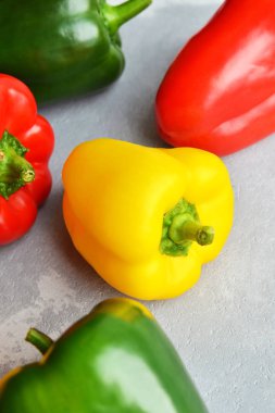 Multi-colored organic fresh sweet bell peppers. Green, red and yellow vegetables. Healthy food concept